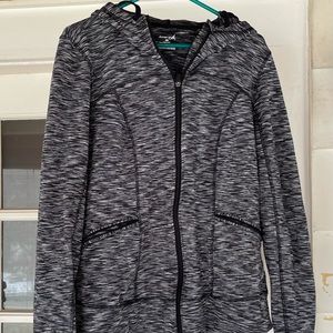 Exertek zip up with thumb holes. Never worn. Size L.